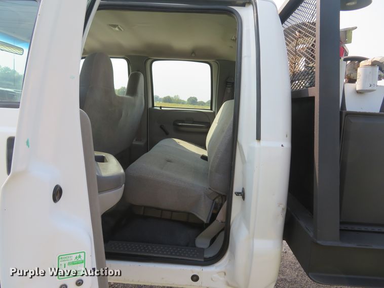 image for item DH1588 1999 Ford F550 Super Duty Crew Cab flatbed truck