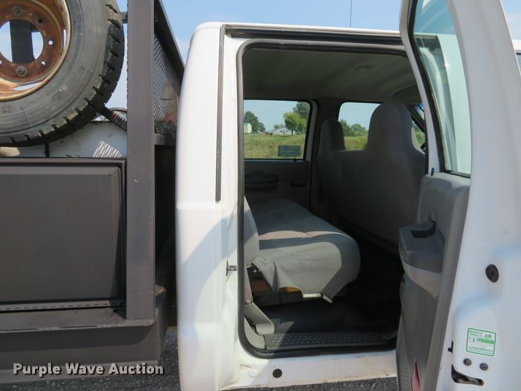 image for item DH1588 1999 Ford F550 Super Duty Crew Cab flatbed truck