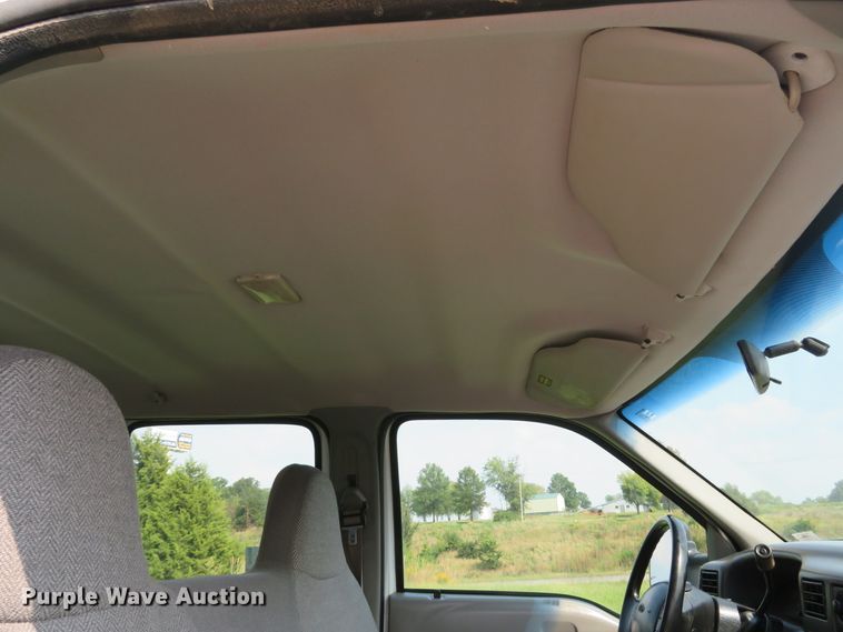 image for item DH1588 1999 Ford F550 Super Duty Crew Cab flatbed truck