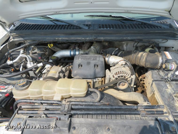 image for item DH1588 1999 Ford F550 Super Duty Crew Cab flatbed truck