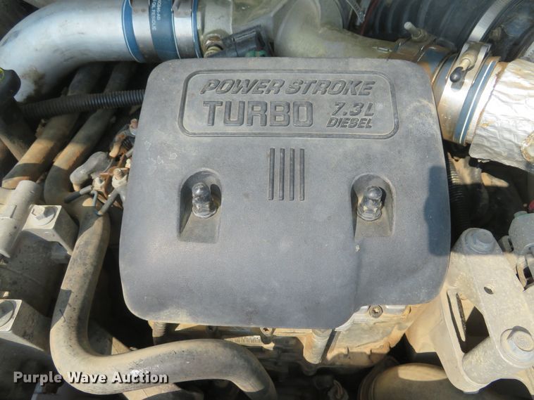 image for item DH1588 1999 Ford F550 Super Duty Crew Cab flatbed truck