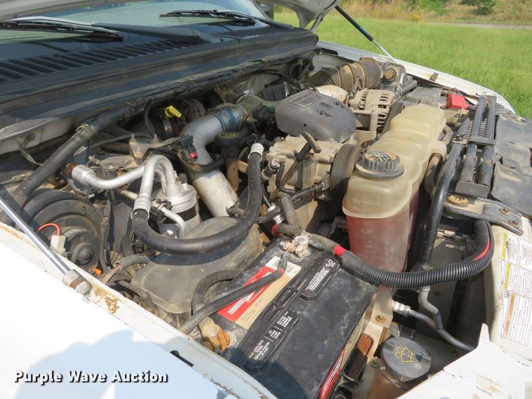 image for item DH1588 1999 Ford F550 Super Duty Crew Cab flatbed truck