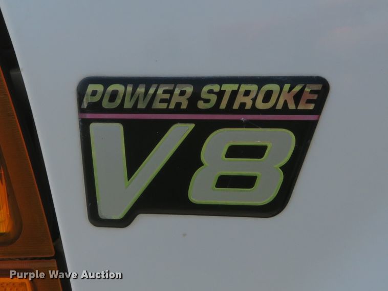 image for item DH1588 1999 Ford F550 Super Duty Crew Cab flatbed truck