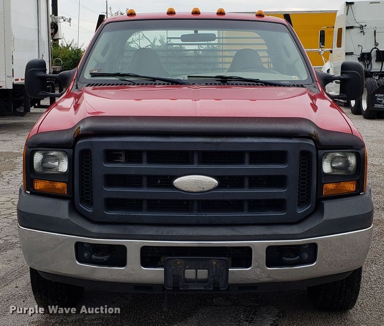 image for item DH2855 2006 Ford F350 Super Duty SuperCab flatbed pickup truck