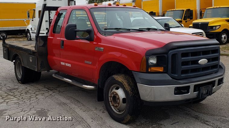 image for item DH2855 2006 Ford F350 Super Duty SuperCab flatbed pickup truck