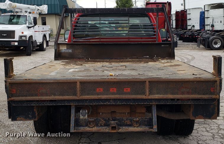 image for item DH2855 2006 Ford F350 Super Duty SuperCab flatbed pickup truck