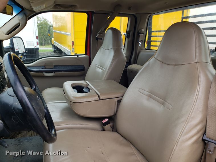 image for item DH2855 2006 Ford F350 Super Duty SuperCab flatbed pickup truck