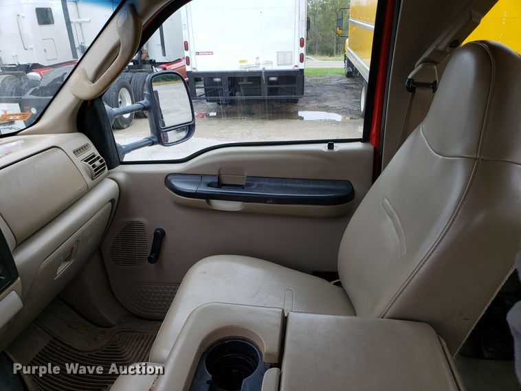 image for item DH2855 2006 Ford F350 Super Duty SuperCab flatbed pickup truck