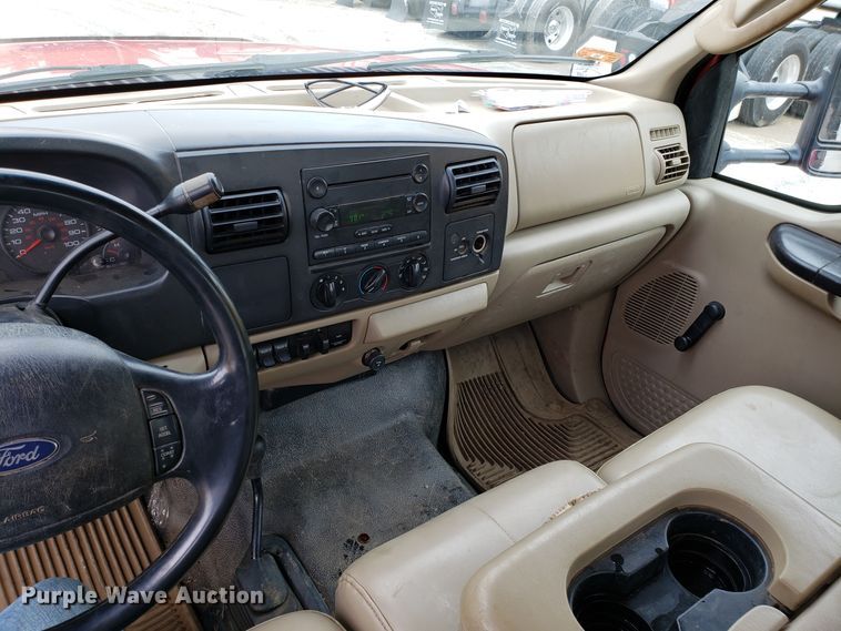 image for item DH2855 2006 Ford F350 Super Duty SuperCab flatbed pickup truck