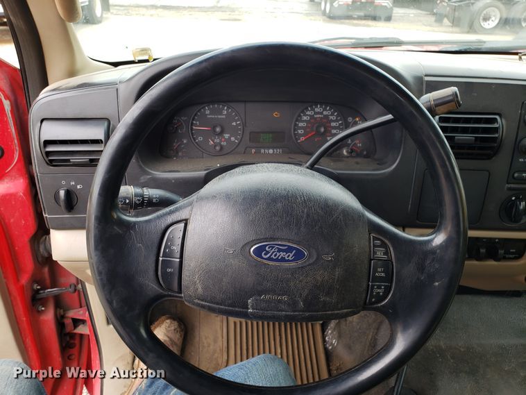 image for item DH2855 2006 Ford F350 Super Duty SuperCab flatbed pickup truck