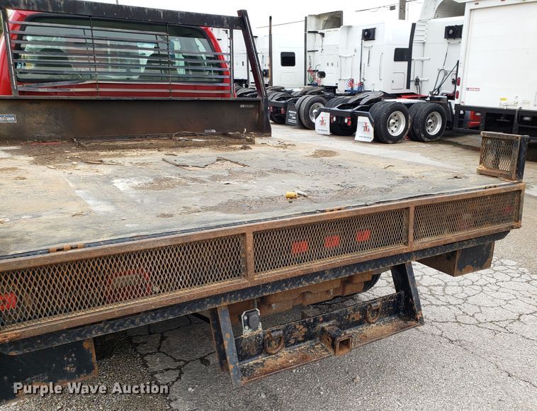 image for item DH2855 2006 Ford F350 Super Duty SuperCab flatbed pickup truck
