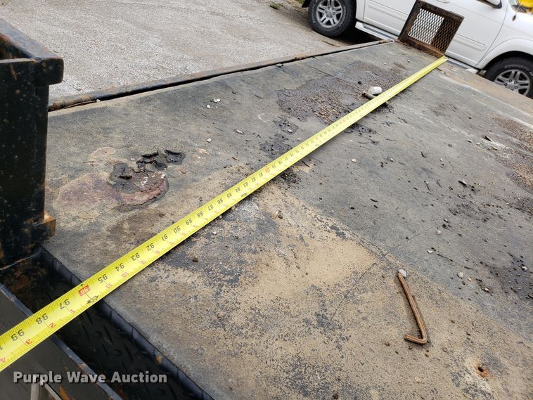 image for item DH2855 2006 Ford F350 Super Duty SuperCab flatbed pickup truck