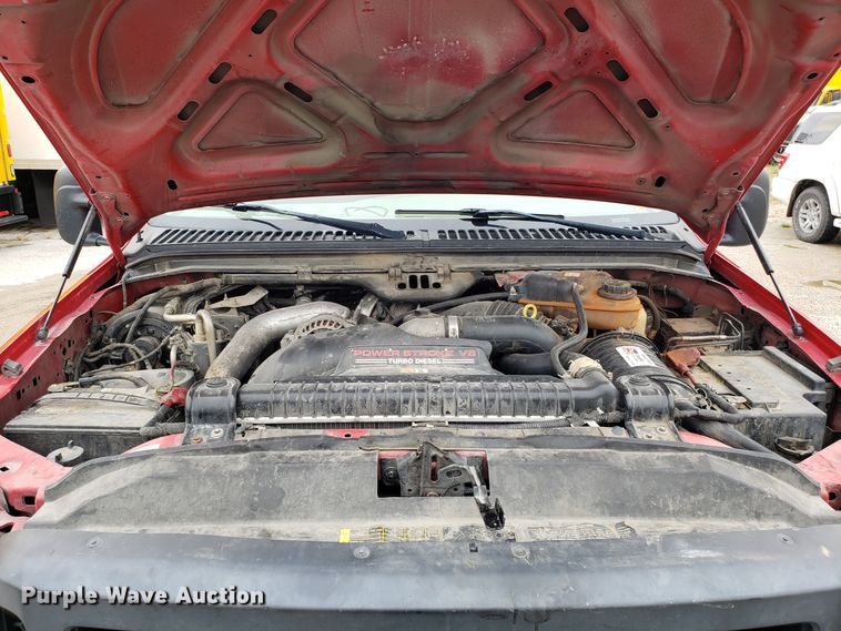 image for item DH2855 2006 Ford F350 Super Duty SuperCab flatbed pickup truck