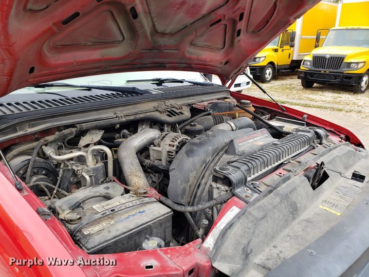 image for item DH2855 2006 Ford F350 Super Duty SuperCab flatbed pickup truck