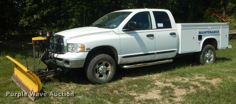 image for item DH6129 2005 Dodge Ram 2500 Quad Cab utility bed pickup truck