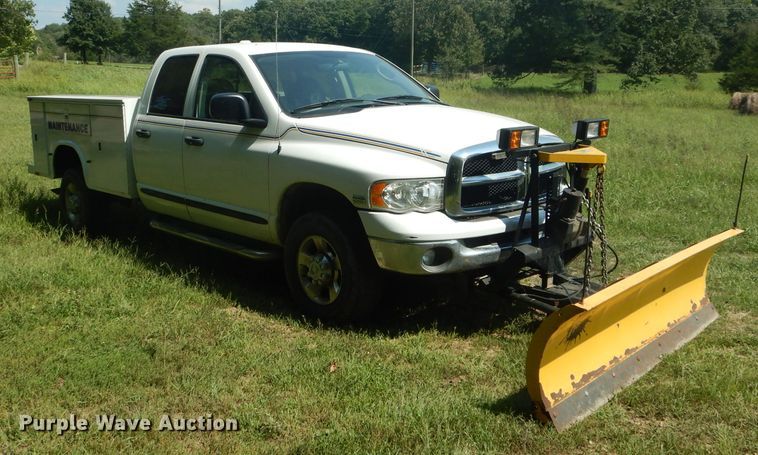 image for item DH6129 2005 Dodge Ram 2500 Quad Cab utility bed pickup truck