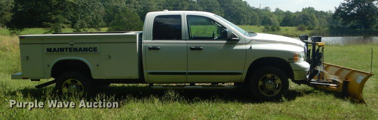 image for item DH6129 2005 Dodge Ram 2500 Quad Cab utility bed pickup truck