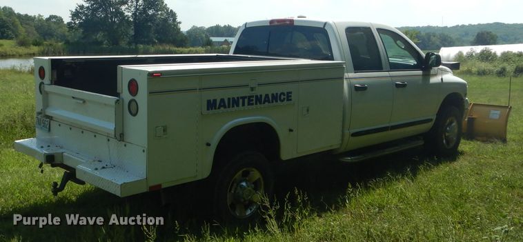 image for item DH6129 2005 Dodge Ram 2500 Quad Cab utility bed pickup truck