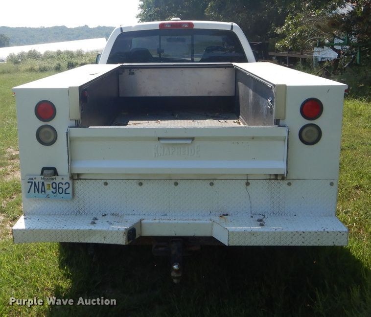 image for item DH6129 2005 Dodge Ram 2500 Quad Cab utility bed pickup truck