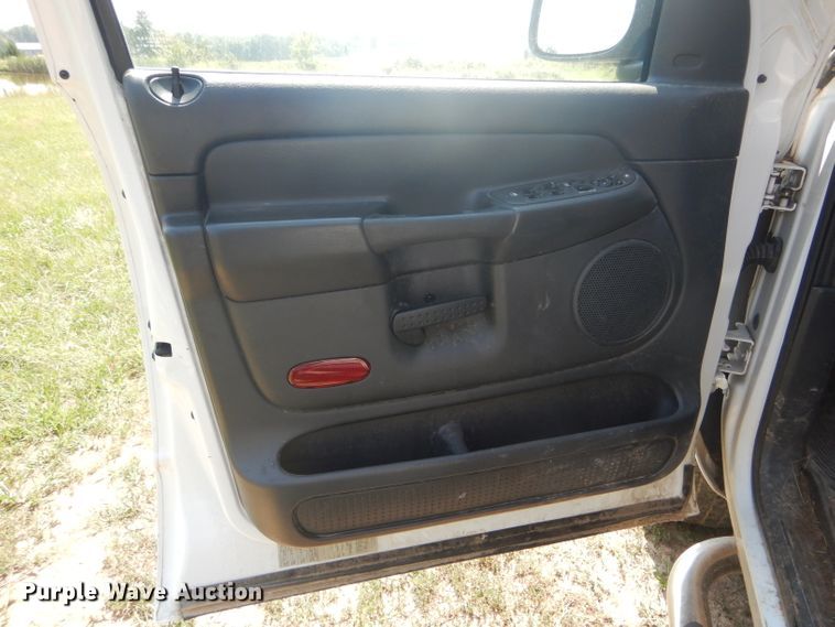 image for item DH6129 2005 Dodge Ram 2500 Quad Cab utility bed pickup truck