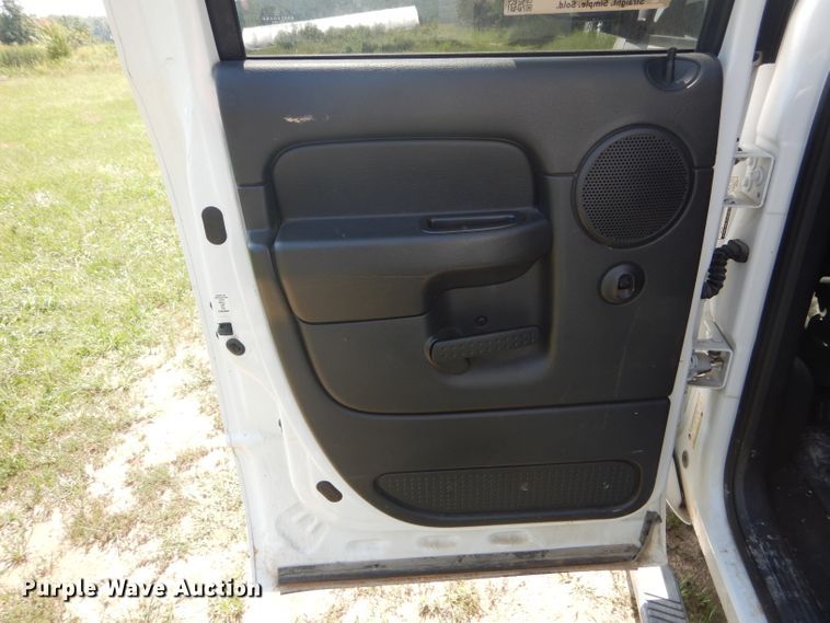 image for item DH6129 2005 Dodge Ram 2500 Quad Cab utility bed pickup truck