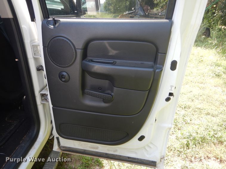 image for item DH6129 2005 Dodge Ram 2500 Quad Cab utility bed pickup truck