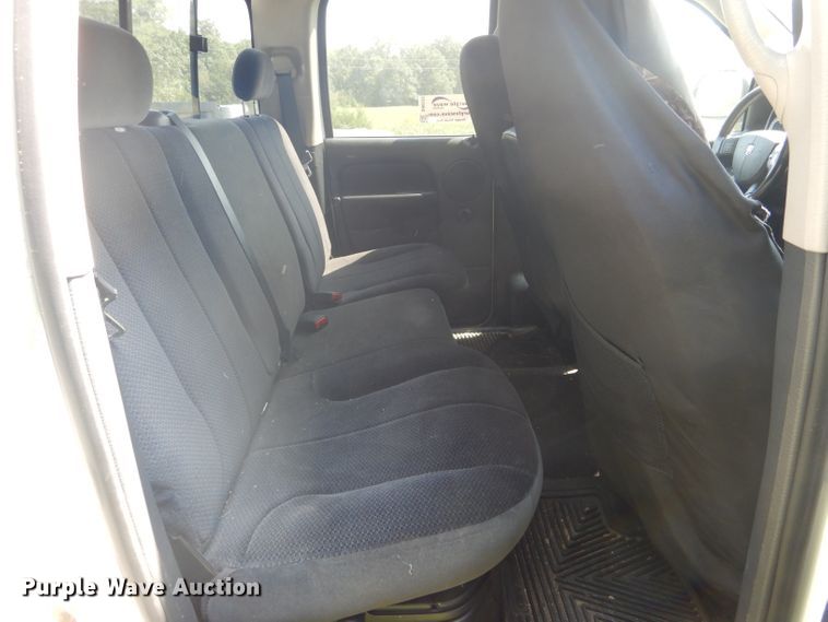 image for item DH6129 2005 Dodge Ram 2500 Quad Cab utility bed pickup truck