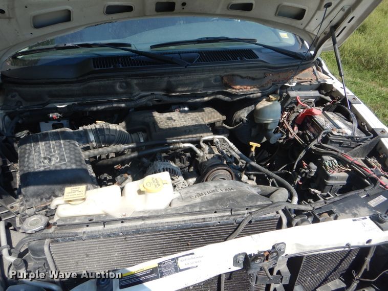 image for item DH6129 2005 Dodge Ram 2500 Quad Cab utility bed pickup truck