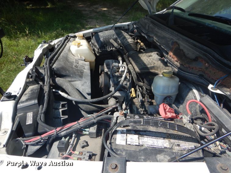 image for item DH6129 2005 Dodge Ram 2500 Quad Cab utility bed pickup truck