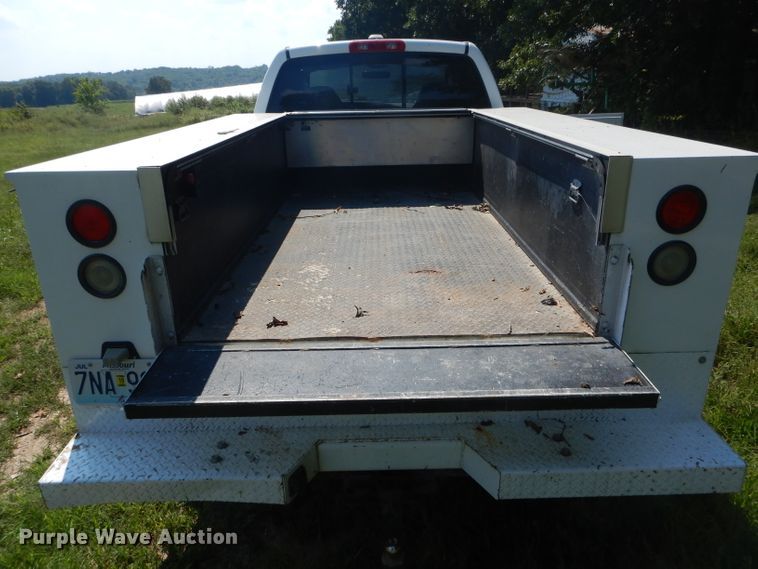 image for item DH6129 2005 Dodge Ram 2500 Quad Cab utility bed pickup truck