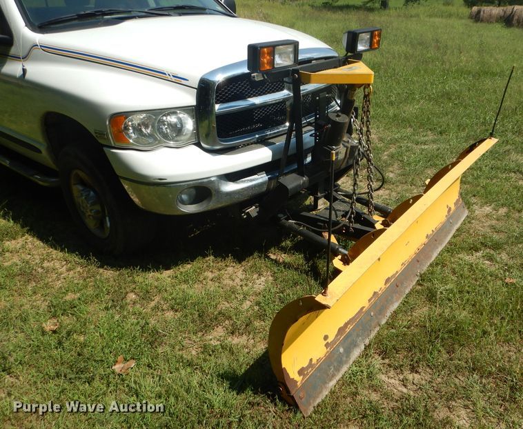 image for item DH6129 2005 Dodge Ram 2500 Quad Cab utility bed pickup truck