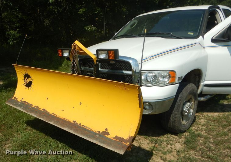 image for item DH6129 2005 Dodge Ram 2500 Quad Cab utility bed pickup truck