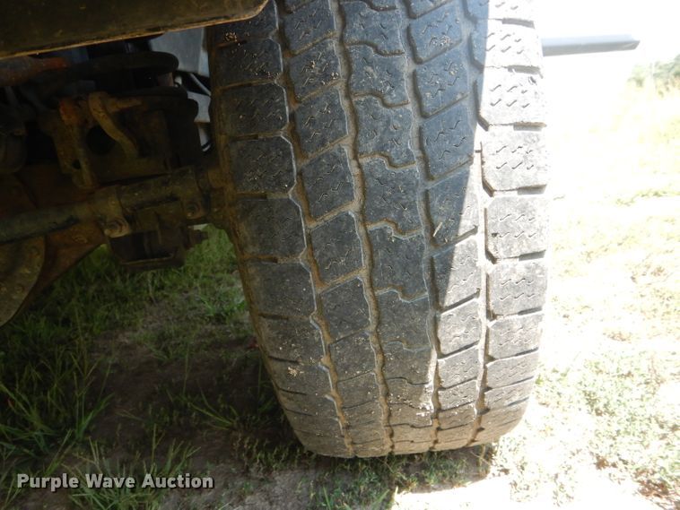 image for item DH6129 2005 Dodge Ram 2500 Quad Cab utility bed pickup truck