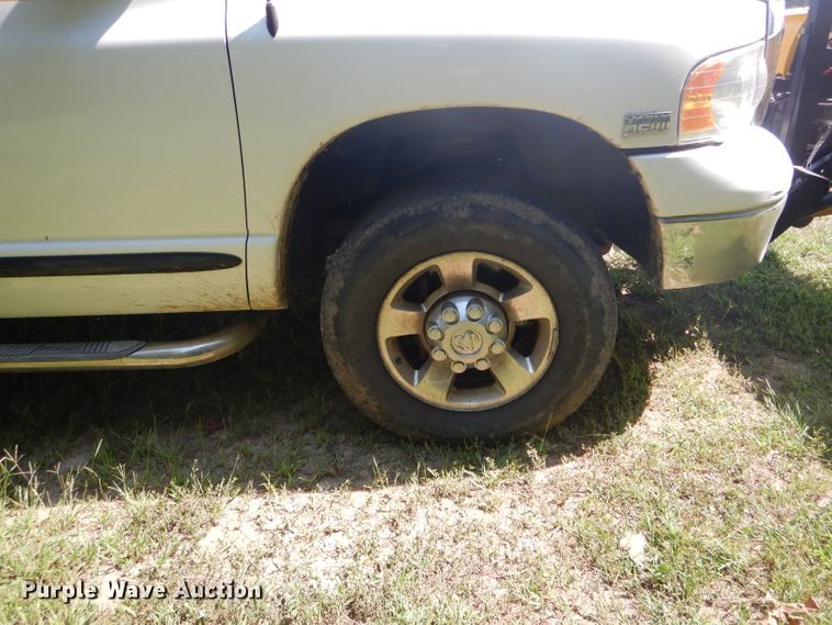 image for item DH6129 2005 Dodge Ram 2500 Quad Cab utility bed pickup truck