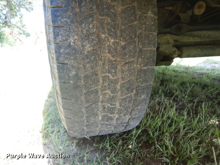 image for item DH6129 2005 Dodge Ram 2500 Quad Cab utility bed pickup truck