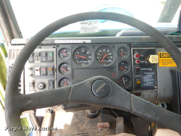 image for item FC9929 1999 Freightliner FL112 vacuum truck