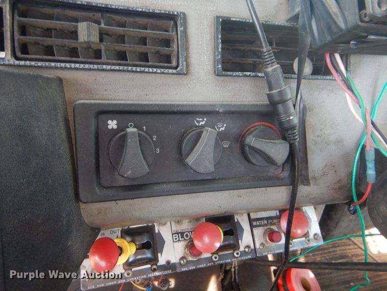 image for item FC9929 1999 Freightliner FL112 vacuum truck