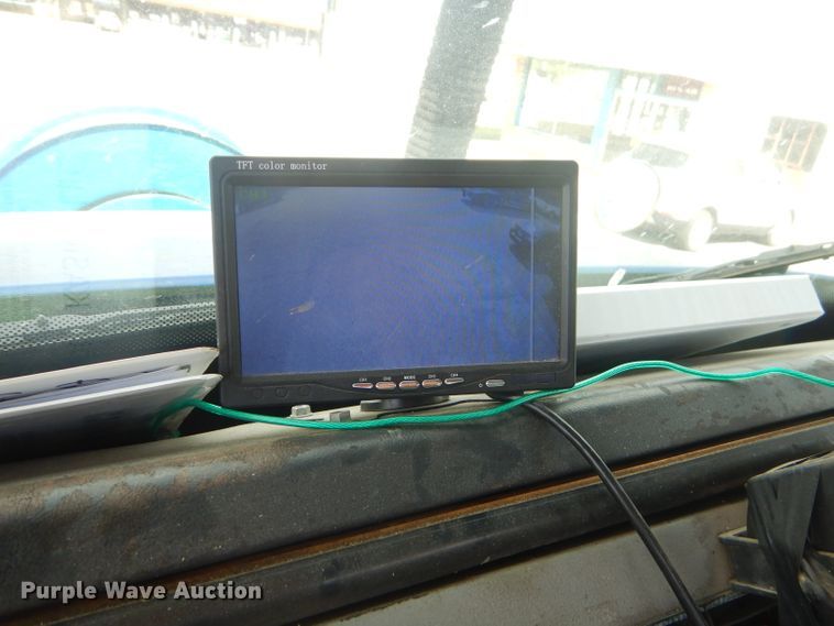 image for item FC9929 1999 Freightliner FL112 vacuum truck