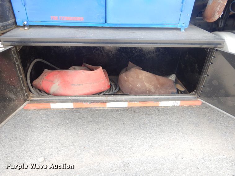 image for item FC9929 1999 Freightliner FL112 vacuum truck