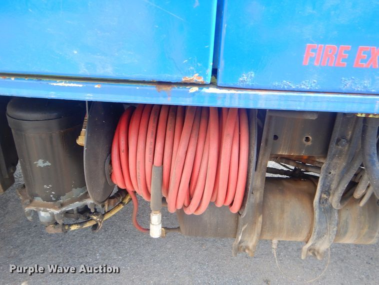 image for item FC9929 1999 Freightliner FL112 vacuum truck