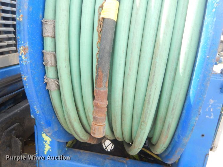 image for item FC9929 1999 Freightliner FL112 vacuum truck