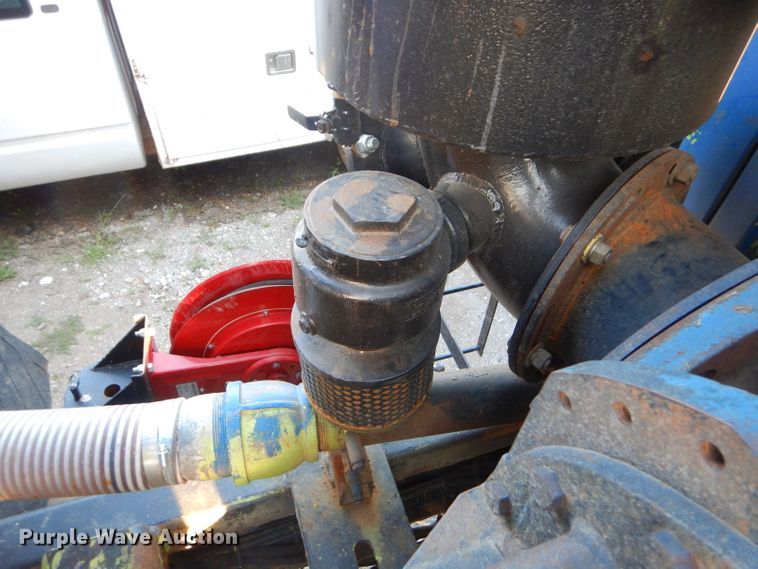 image for item FC9929 1999 Freightliner FL112 vacuum truck