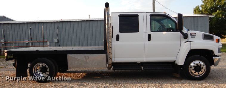 image for item FK9768 2004 GMC C4500 Crew Cab flatbed truck