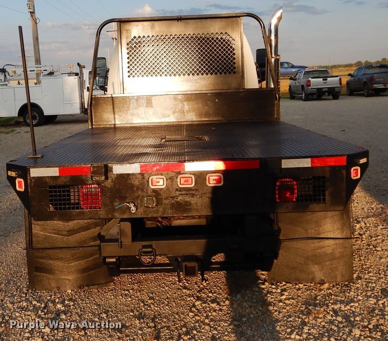 image for item FK9768 2004 GMC C4500 Crew Cab flatbed truck