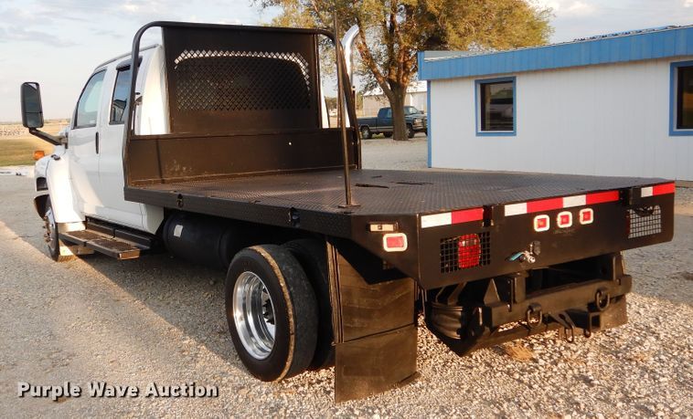 image for item FK9768 2004 GMC C4500 Crew Cab flatbed truck