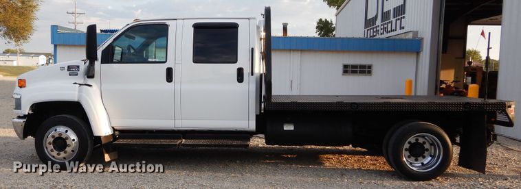 image for item FK9768 2004 GMC C4500 Crew Cab flatbed truck