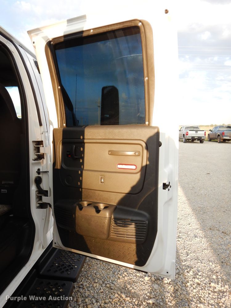 image for item FK9768 2004 GMC C4500 Crew Cab flatbed truck