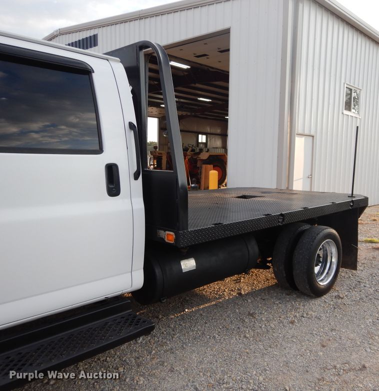 image for item FK9768 2004 GMC C4500 Crew Cab flatbed truck