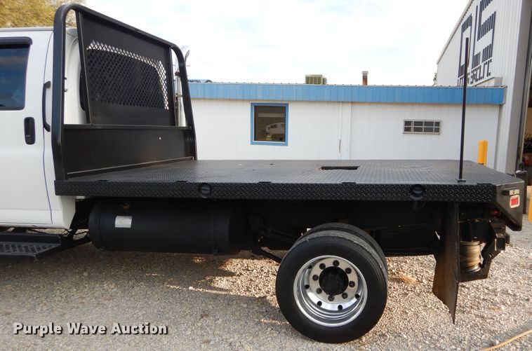 image for item FK9768 2004 GMC C4500 Crew Cab flatbed truck