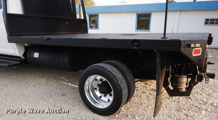 image for item FK9768 2004 GMC C4500 Crew Cab flatbed truck